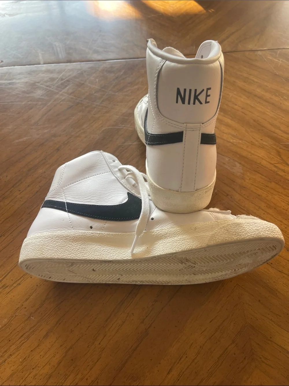 Nike Size 8 White High-Top Sneakers with Black Swoosh